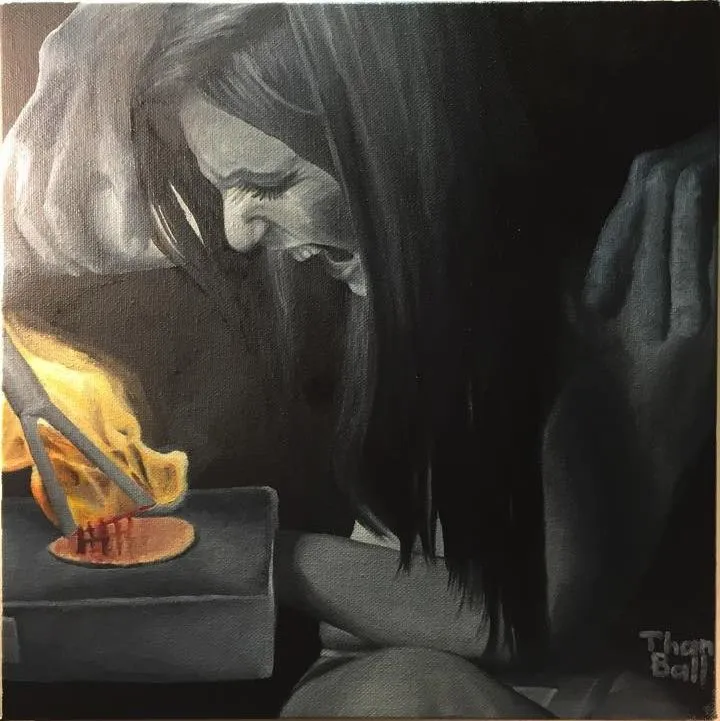 Grayscale painting of a dark-haired woman bent forward, lit by an orange glow