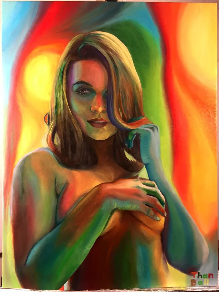 Woman with brown hair holding her hand to her face, painted in vivid reds, oranges and greens