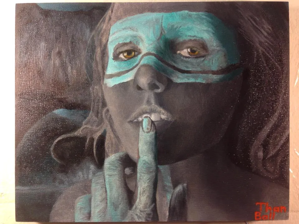 Woman with teal paint across her eyes holding a finger to her lips